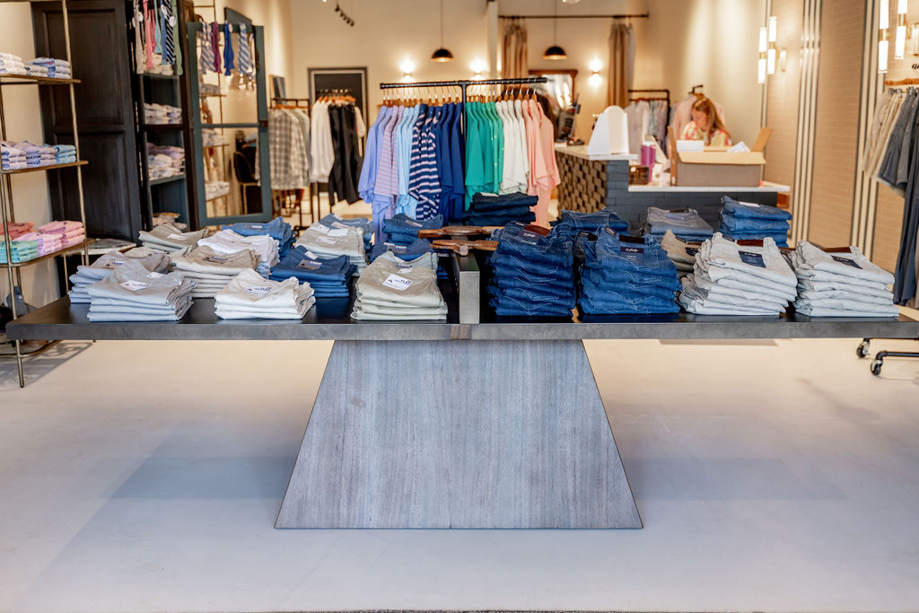 Table of clothes at Sam Howard Men's Clothier in Greensboro