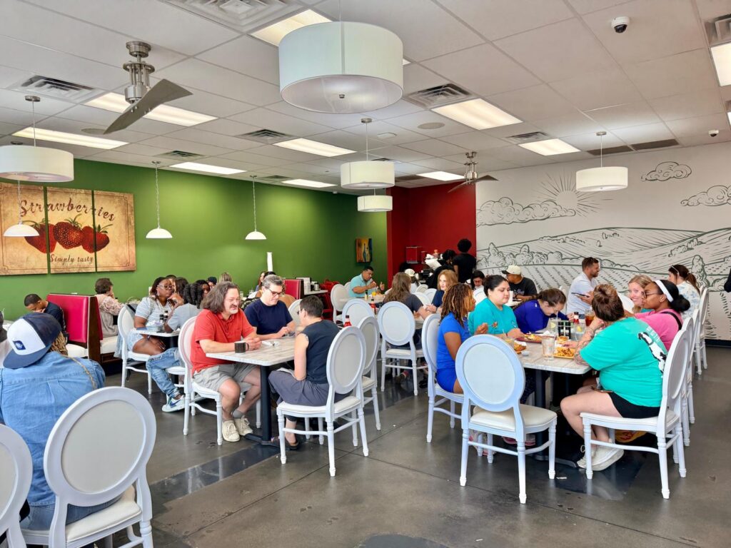Strawberry Restaurant inside sitting area people having breakfast