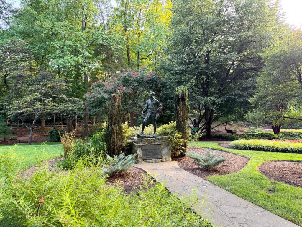 Tanger Family Bicentennial Gardens the student statue