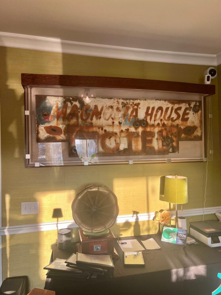 The Historic Magnolia House American restaurant in Greensboro original sign